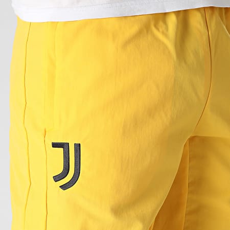 Adidas Performance - Juventus IN6319 Pantalón de chándal con banda amarilla