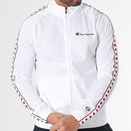 Champion - 219784 Set giacca con zip e pantaloni da jogging bianchi e marini