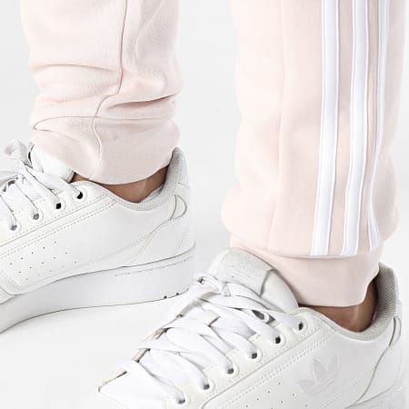 Adidas Sportswear - Pantaloni da jogging a 3 strisce IX2372 Rosa
