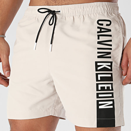 Calvin Klein - Pantaloncini da bagno medi con coulisse grafica 0991 Beige