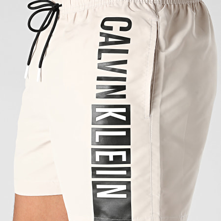 Calvin Klein - Pantaloncini da bagno medi con coulisse grafica 0991 Beige