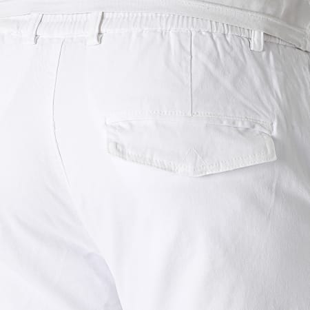 John H - Pantalones blancos