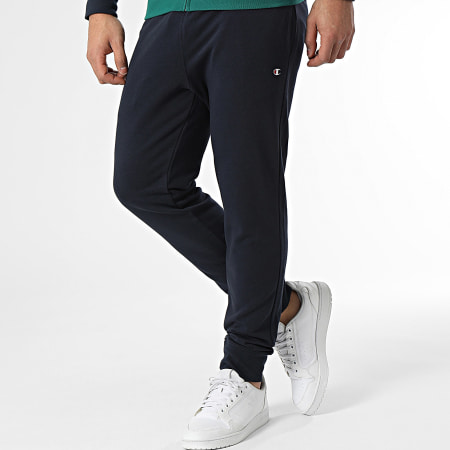 Champion - Felpa con cappuccio e zip e pantaloni da jogging 219943 Set blu navy bianco verde