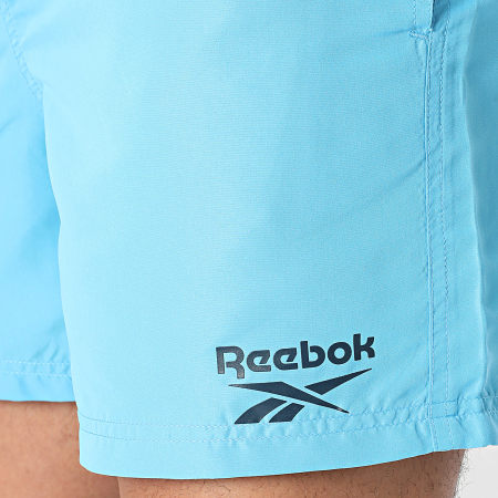 Reebok - L5-71002 Shorts de baño azul claro