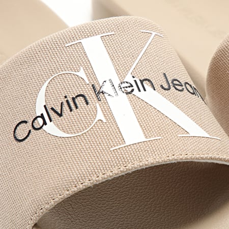 Calvin Klein - Claquettes Slide Monogram 0061 Beige