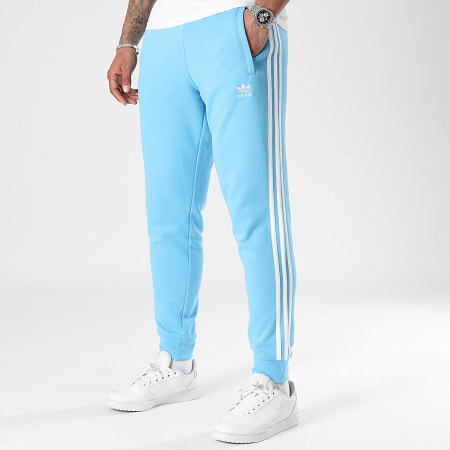 Adidas Originals - Pantaloni da jogging a 3 strisce IM9451 Azzurro