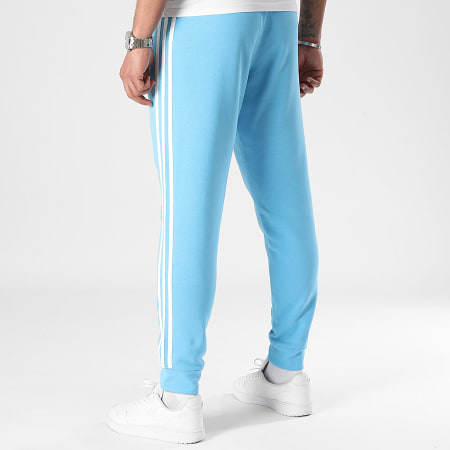 Adidas Originals - Pantalón de chándal 3 rayas IM9451 Azul claro