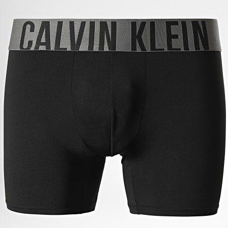 Calvin Klein - Juego De 3 Boxers NB3612A Negro Naranja Gris Azul Real