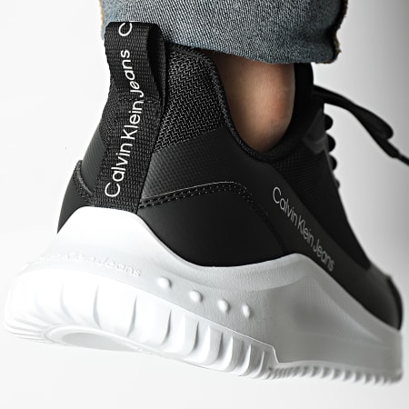 Calvin Klein - Eva Runner Lowlaceup Mix 0906 Nero Bianco brillante Argento Sneakers