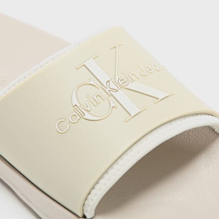 Calvin Klein - Claquettes Femme Slide Monogram 0585 Eggshell Creamy White