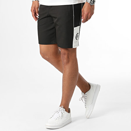 Comme Des Loups - Set fresco di maglietta bianca e nera e pantaloncini da jogging