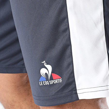 Le Coq Sportif - Match 2320118 Pantalón corto a rayas azul marino y blanco