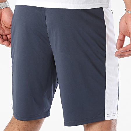 Le Coq Sportif - Match 2320118 Pantalón corto a rayas azul marino y blanco