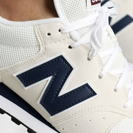 New Balance - GM500RTC Beige Blanco Azul Marino Zapatillas