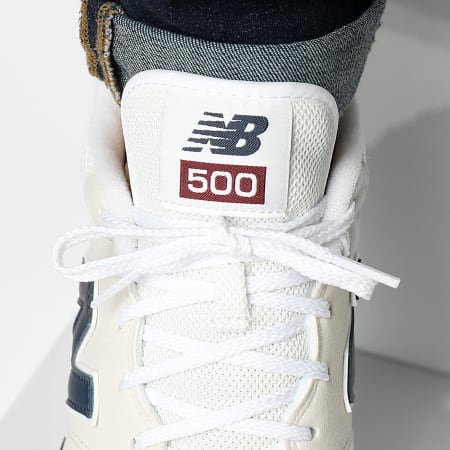 New Balance - GM500RTC Beige Blanco Azul Marino Zapatillas