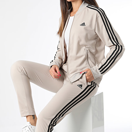 Adidas Sportswear - Tuta da ginnastica da donna IJ8786 Beige Nero