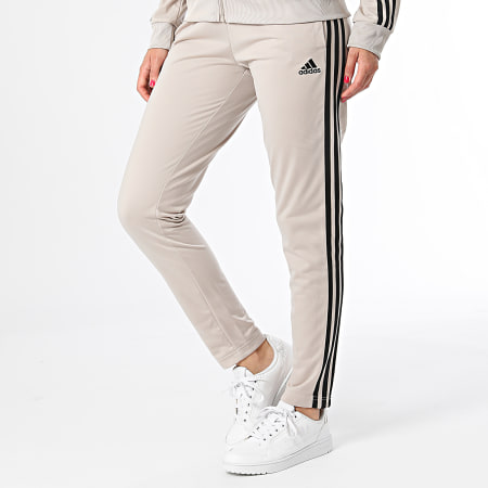 Adidas Sportswear - Tuta da ginnastica da donna IJ8786 Beige Nero