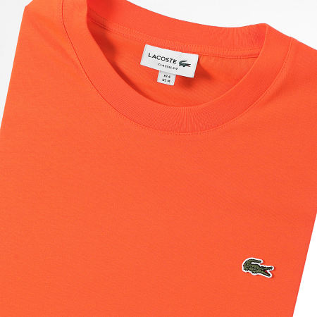 Lacoste - Maglietta Classic Fit arancione con logo ricamato coccodrillo