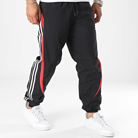 Adidas Originals - Pantaloni da jogging a righe IX9646 Nero Bianco Rosso