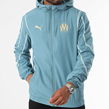 Puma - OM Prematch 778243 Giacca con zip con cappuccio blu chiaro e oro