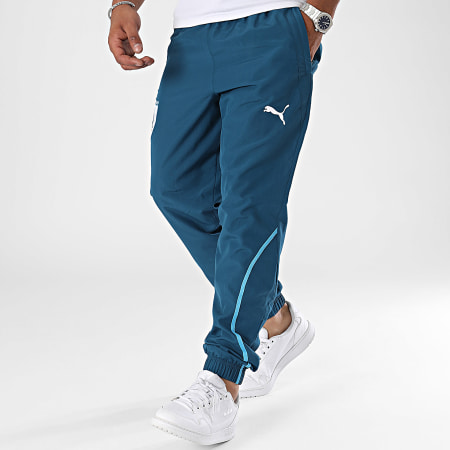 Puma - OM Prematch Woven 778244 Pantalones de chándal azul pato