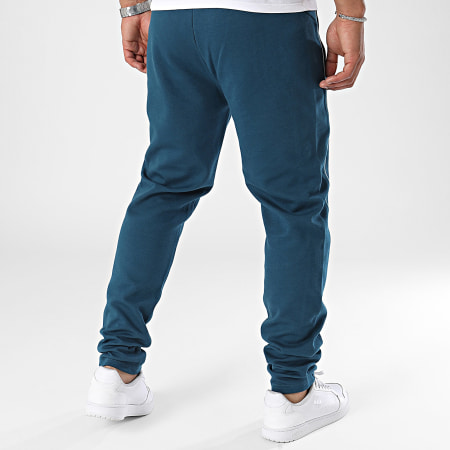 Puma - OM Casuals 778258 Pantalones de chándal azul pato