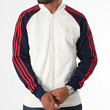 Adidas Originals - Veste Zippée A Bandes SST IY9859 Blanc Clair Bleu Marine