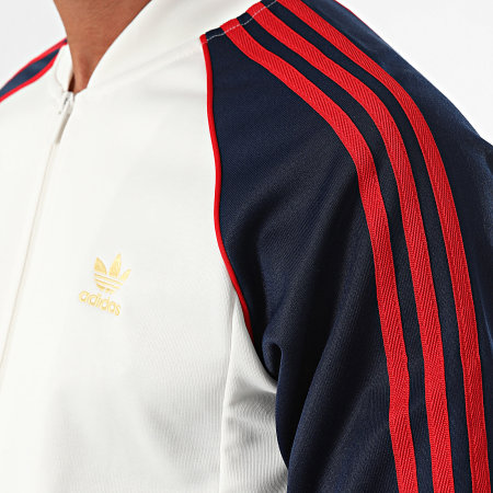 Adidas Originals - Veste Zippée A Bandes SST IY9859 Blanc Clair Bleu Marine