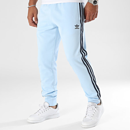 Adidas Originals - SST IY8730 Pantaloni da jogging a bande blu chiaro