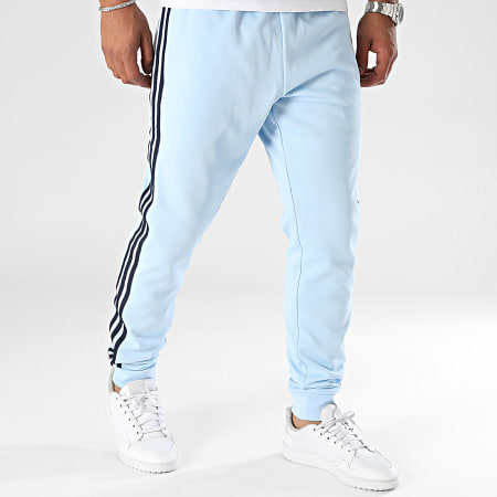 Adidas Originals - SST IY8730 Pantaloni da jogging a bande blu chiaro