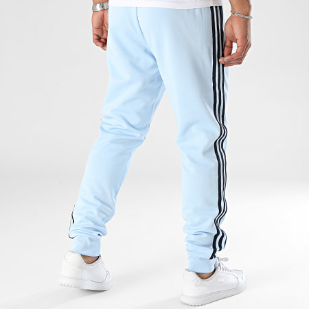 Adidas Originals - SST IY8730 Lichtblauwe gebandeerde joggingbroek