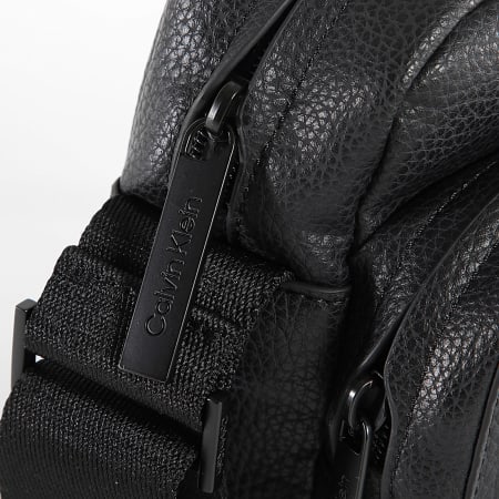 Calvin Klein - Sacoche Must Reporter 2204 Noir