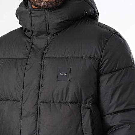 Calvin Klein - Lange gewatteerde capuchonpuffer 3465 Zwart