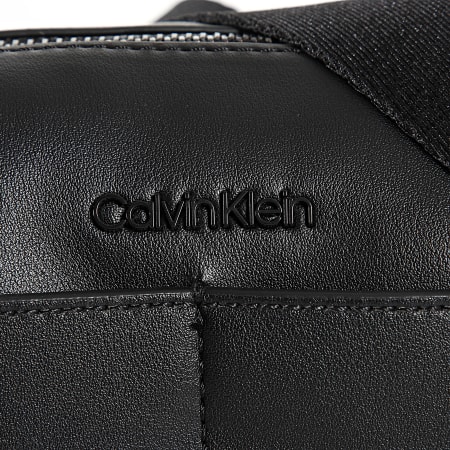 Calvin Klein - Bolsa para cámara Clean Essential 2184 Negra