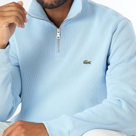 Lacoste Jersey azul claro con logo bordado de cocodrilo y cuello con cremallera Ryses