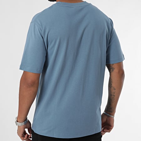 New Balance - Relaxed Fit T-shirt MT41533 Lichtblauw