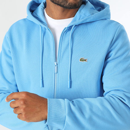 Sweat zippé capuche lacoste 2025