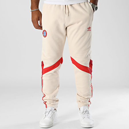 Adidas Originals - Pantaloni da jogging a bande beige del Bayern Monaco IS6510