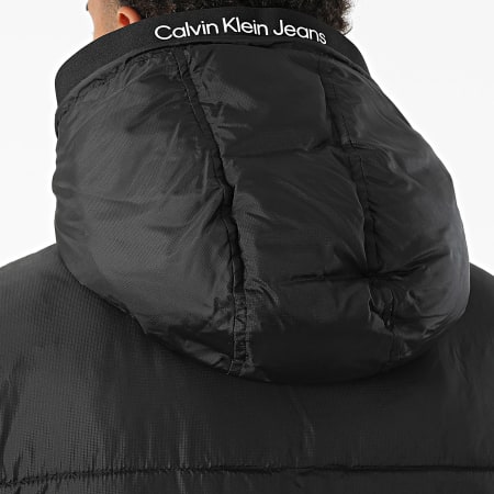 Calvin Klein - Doudoune Capuche Logo Tape Padded 0922 Noir