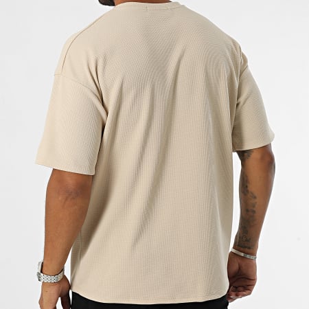 Uniplay - Camiseta de bolsillo oversize beige