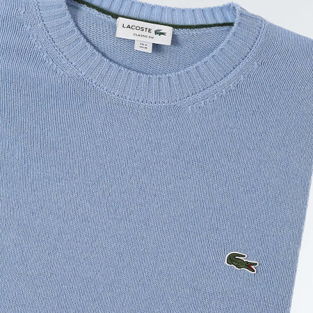 Pull lacoste bleu blanc hot sale