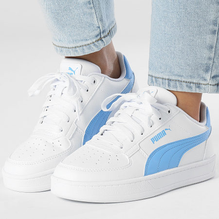 Puma white with blue stripe top