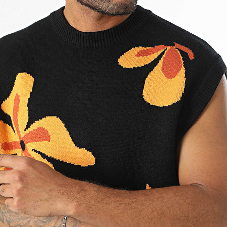 Pull noir et orange top