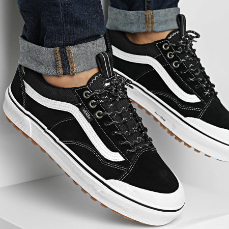 Vans nere basse con striscia bianca on sale