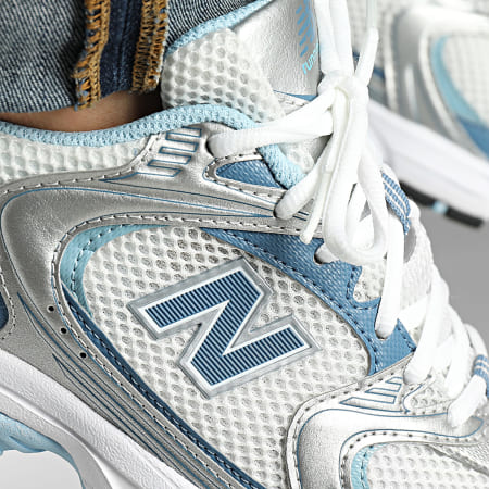 New balance bleu et argent 2025