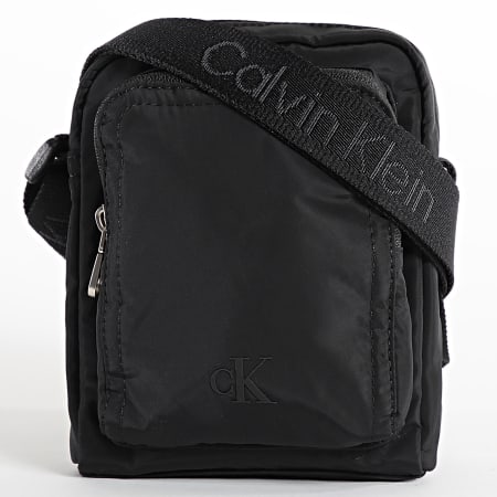 Calvin Klein - Sacoche Ultralight Reporter 3024 Noir