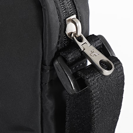Calvin Klein - Sacoche Ultralight Reporter 3024 Noir