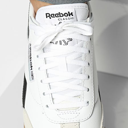 Reebok zapatos de goma blancos top
