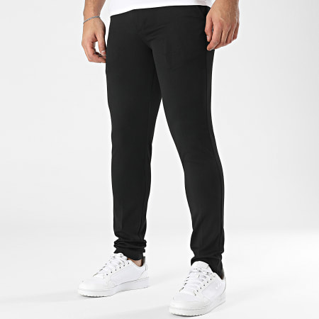 Pantaloni asics a zampa 2025