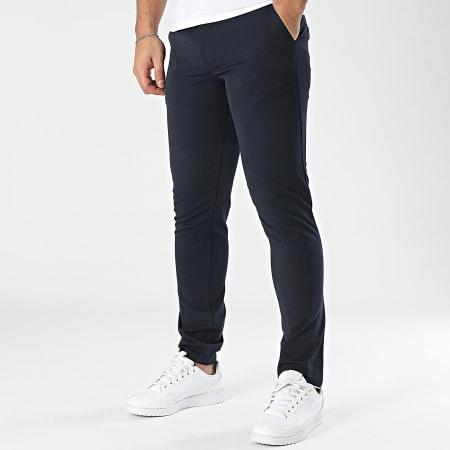 Pantaloni asics a zampa discount